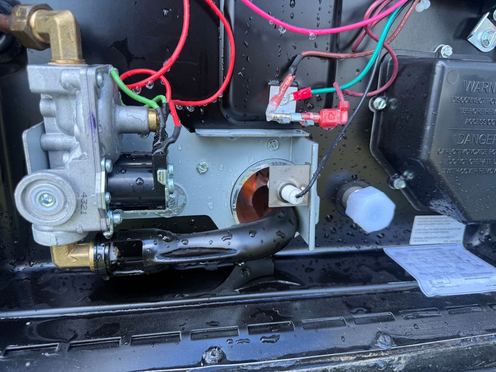 RV water heater burner assembly during mobile appliance service